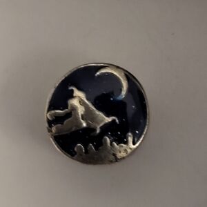 Disney " you fill my world with wonder" charm.  Magic carpet ride.  Silver